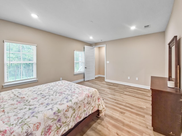 16814 W Landon Green Dr, Gulfport, MS 39503 - bedroom with wood finished floors and recessed lighting