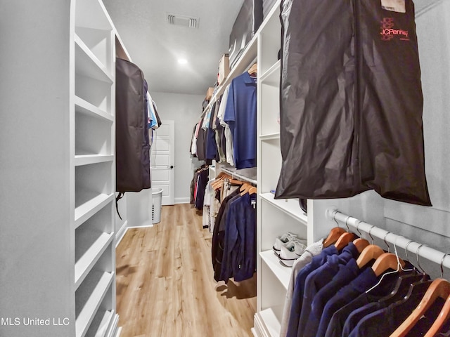 16814 W Landon Green Dr, Gulfport, MS 39503 - walk in closet featuring light wood-type flooring