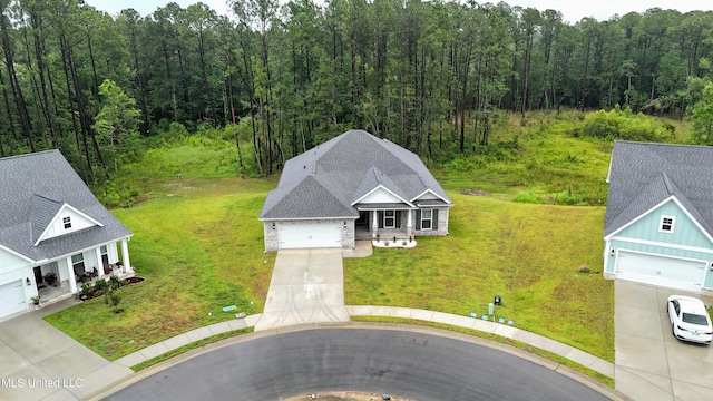 16814 W Landon Green Dr, Gulfport, MS 39503 - aerial view of property and surrounding area with a heavily wooded area