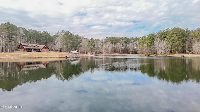 view of water feature with a wooded view