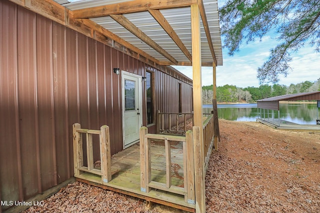 wooden deck with a water view