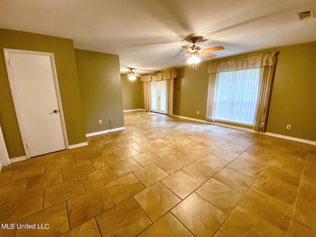 unfurnished room featuring ceiling fan