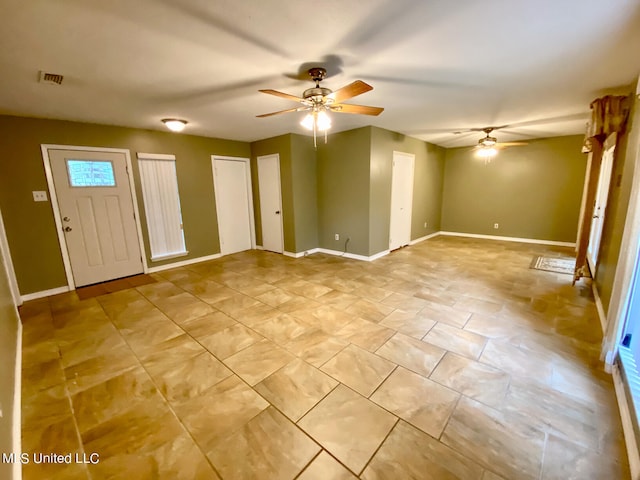 entryway with ceiling fan