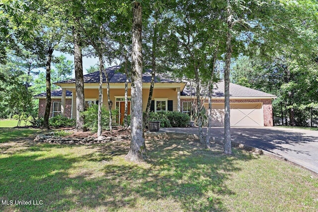 105 Speers Valley Rd, Brandon, MS 39042 - ranch-style home featuring driveway, a garage, brick siding, and a front lawn