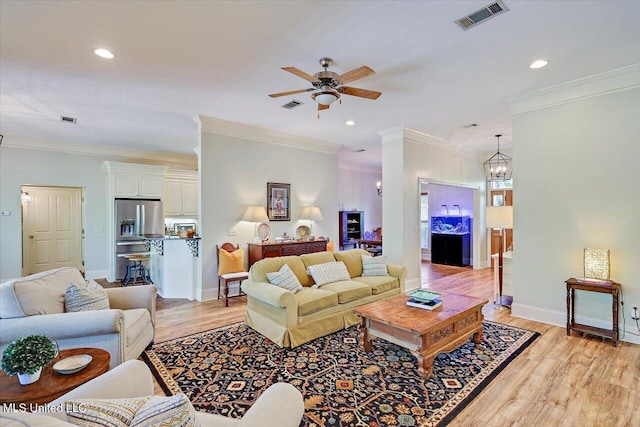 105 Speers Valley Rd, Brandon, MS 39042 - living room featuring light wood-style flooring, crown molding, ceiling fan, recessed lighting, and baseboards