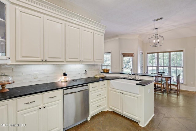 105 Speers Valley Rd, Brandon, MS 39042 - kitchen with dishwasher, a sink, tasteful backsplash, a chandelier, and a peninsula