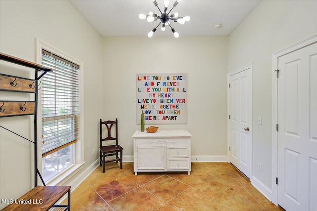 105 Speers Valley Rd, Brandon, MS 39042 - sitting room with a chandelier, light tile patterned floors, and baseboards