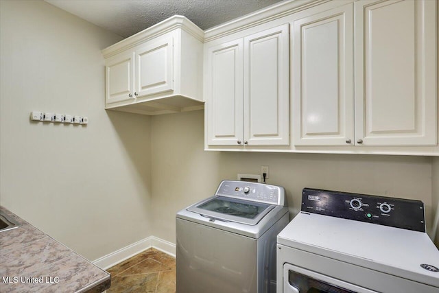 105 Speers Valley Rd, Brandon, MS 39042 - washroom with cabinet space, washing machine and dryer, and baseboards