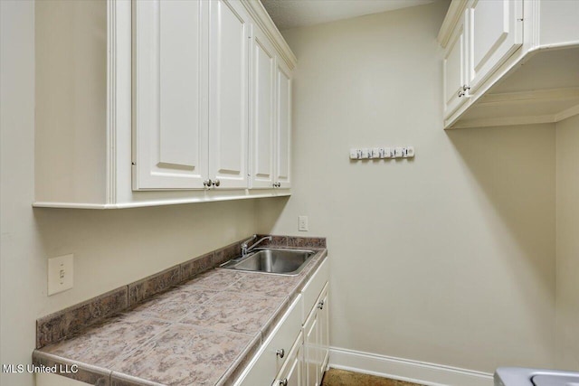105 Speers Valley Rd, Brandon, MS 39042 - washroom with a sink and baseboards