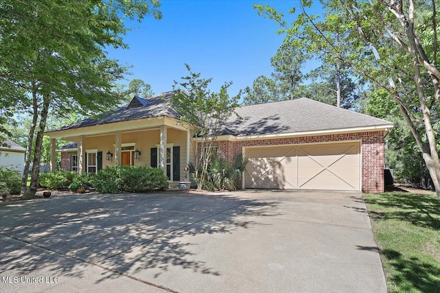 105 Speers Valley Rd, Brandon, MS 39042 - view of front of house featuring driveway, brick siding, and an attached garage