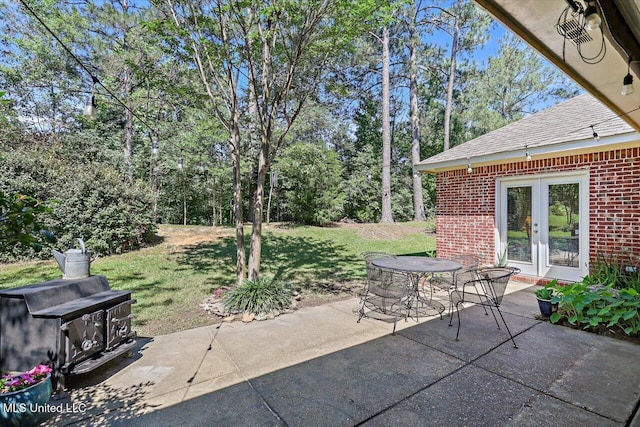 105 Speers Valley Rd, Brandon, MS 39042 - view of patio / terrace featuring french doors and outdoor dining area