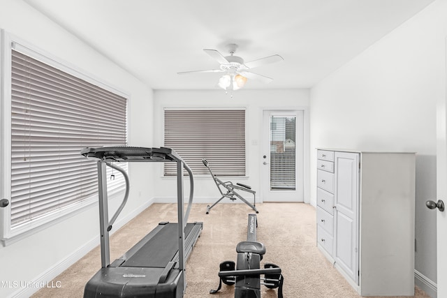 workout room featuring ceiling fan