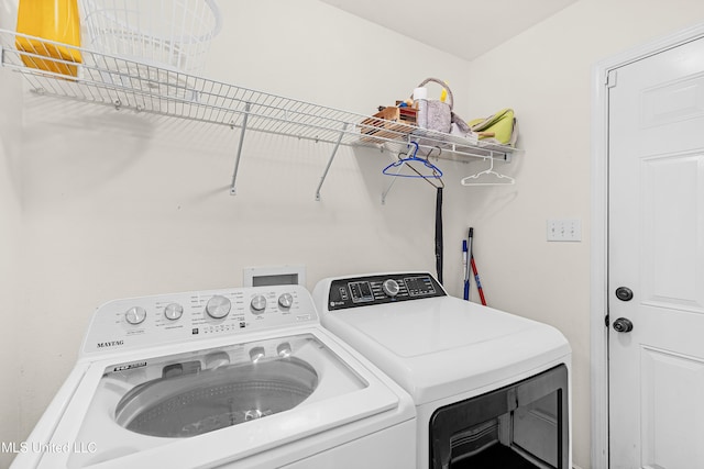 laundry room featuring independent washer and dryer