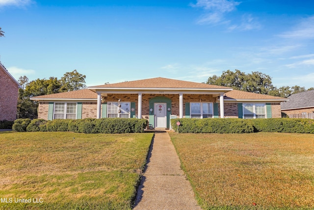 view of front of property with a front lawn