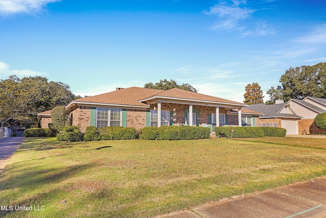 ranch-style house with a front yard