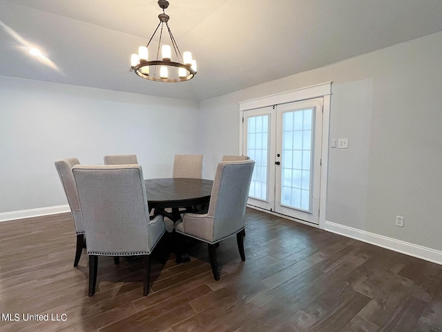 106 Piney Ridge Rd, Waveland, MS 39576 - dining area with an inviting chandelier, baseboards, french doors, and dark wood finished floors