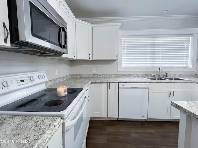 106 Piney Ridge Rd, Waveland, MS 39576 - kitchen featuring a sink, white dishwasher, white cabinetry, and crown molding