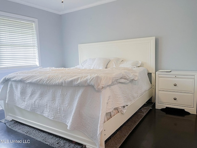 bedroom featuring ornamental molding