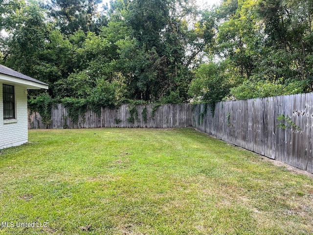 106 Piney Ridge Rd, Waveland, MS 39576 - view of yard with a fenced backyard