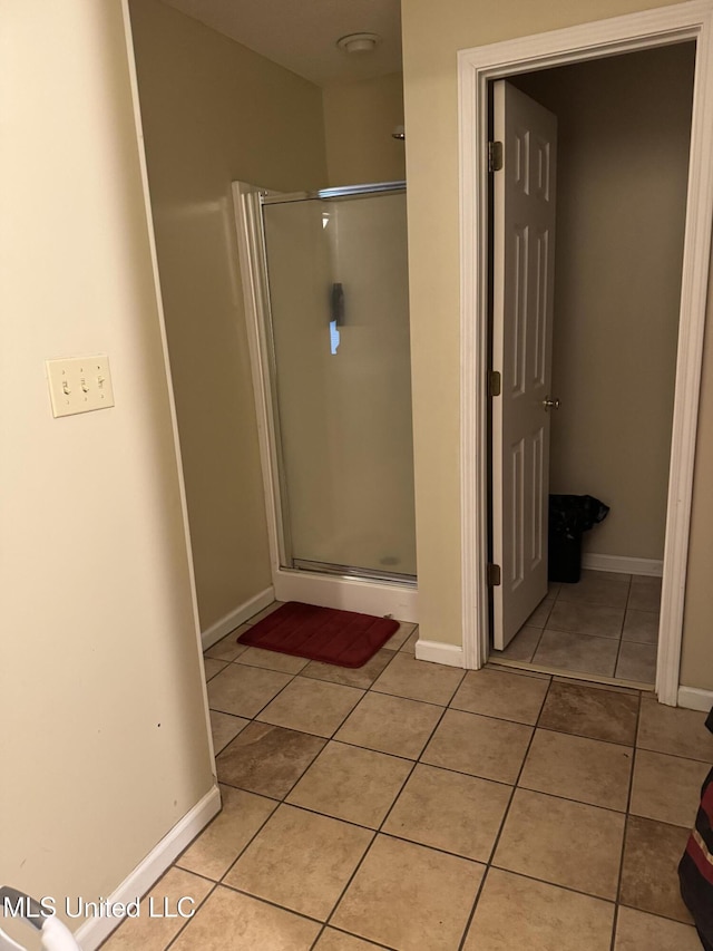 127 Nichols Blvd, Senatobia, MS 38668 - full bath featuring tile patterned flooring and a shower stall