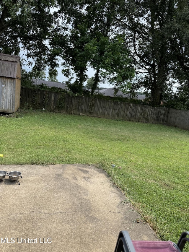 127 Nichols Blvd, Senatobia, MS 38668 - fenced backyard with a patio area