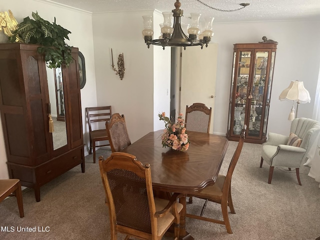 13137 Old Port Gibson Rd, Utica, MS 39175 - dining space featuring light carpet, ornamental molding, a chandelier, and a textured ceiling