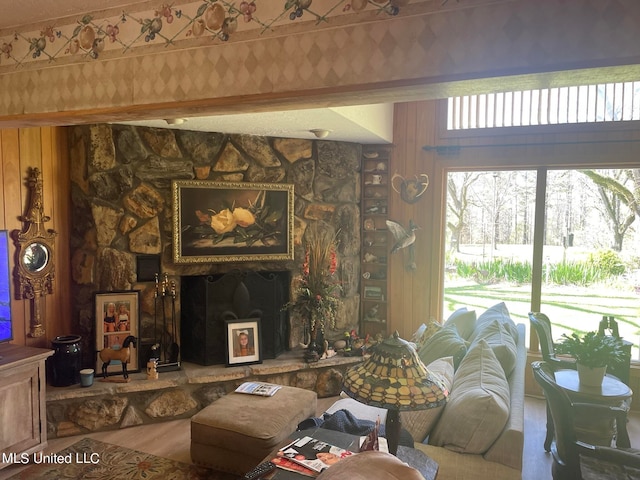 living room featuring hardwood / wood-style flooring and a fireplace