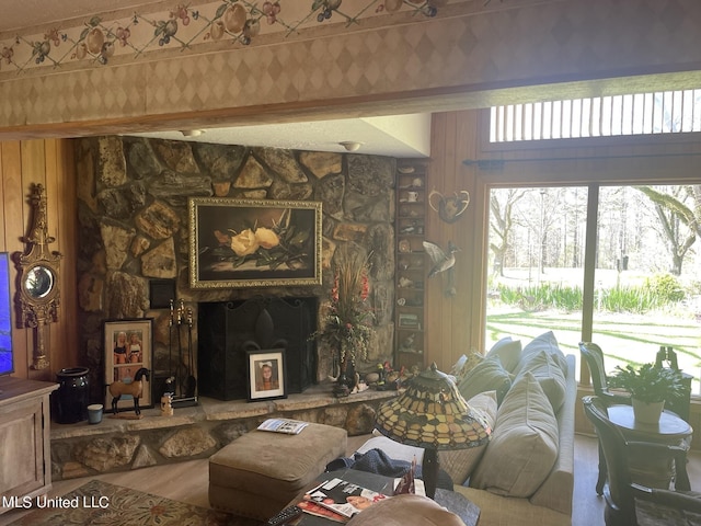 13137 Old Port Gibson Rd, Utica, MS 39175 - living room with wood finished floors and a fireplace with raised hearth