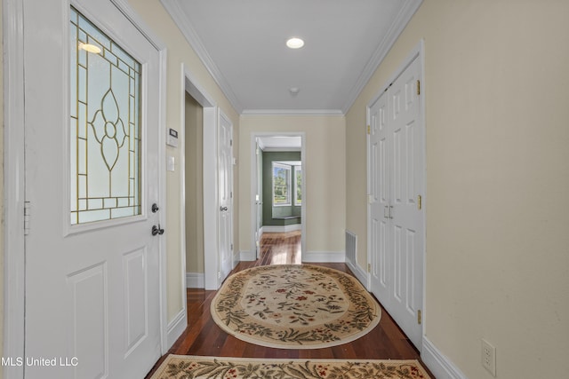 420 N Caribe Pl, Gulfport, MS 39507 - entrance foyer with dark wood-type flooring, baseboards, and ornamental molding
