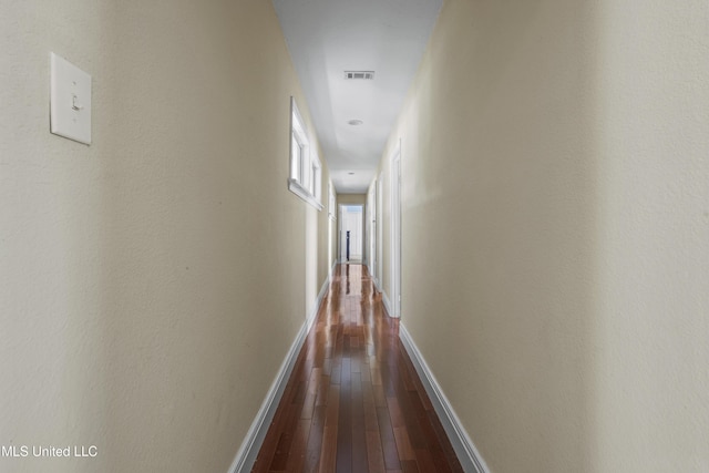 420 N Caribe Pl, Gulfport, MS 39507 - hall featuring dark wood finished floors and baseboards