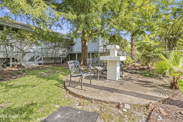 420 N Caribe Pl, Gulfport, MS 39507 - view of grassy yard with stairway and a deck
