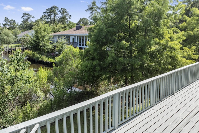 420 N Caribe Pl, Gulfport, MS 39507 - wooden terrace featuring view of wooded area and a water view