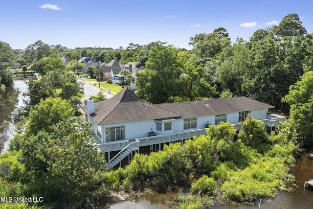 420 N Caribe Pl, Gulfport, MS 39507 - view from above of property with a nearby body of water and a tree filled landscape
