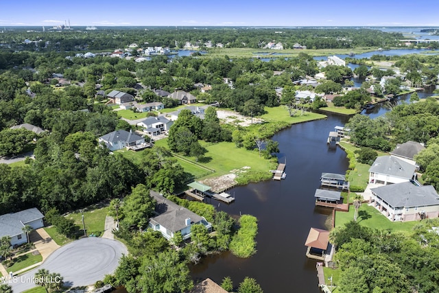 420 N Caribe Pl, Gulfport, MS 39507 - aerial overview of property's location featuring a large body of water, nearby suburban area, and a tree filled landscape