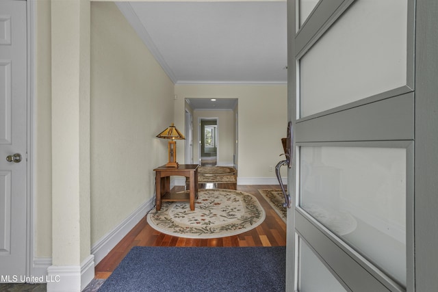 420 N Caribe Pl, Gulfport, MS 39507 - entrance foyer featuring ornamental molding, wood finished floors, and baseboards