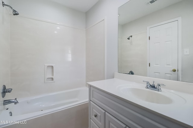 bathroom with vanity and shower / bathing tub combination