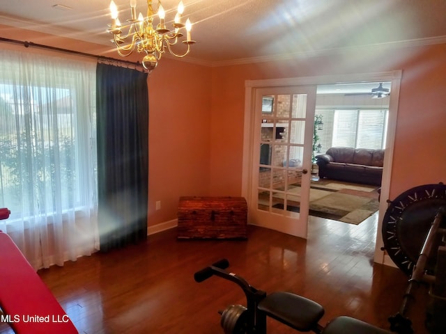 701 W Gresham St, Indianola, MS 38751 - workout area featuring wood-type flooring, a chandelier, and crown molding