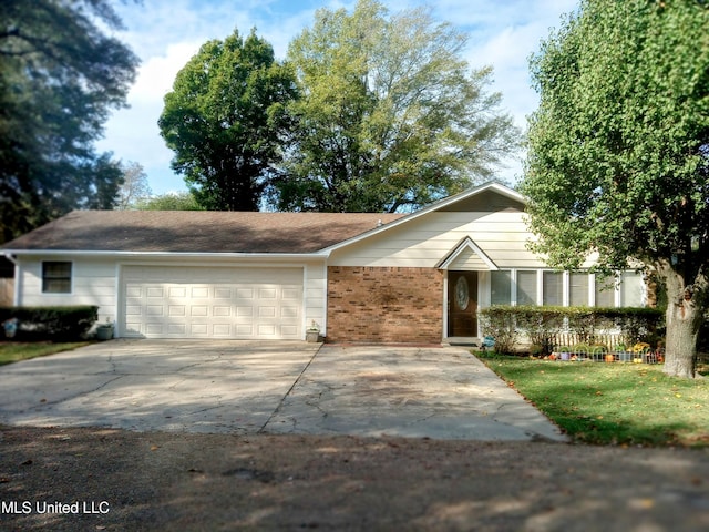 701 W Gresham St, Indianola, MS 38751 - ranch-style house featuring a garage