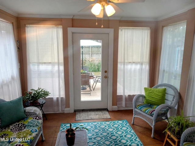 701 W Gresham St, Indianola, MS 38751 - entryway featuring light tile patterned floors, ceiling fan, and crown molding
