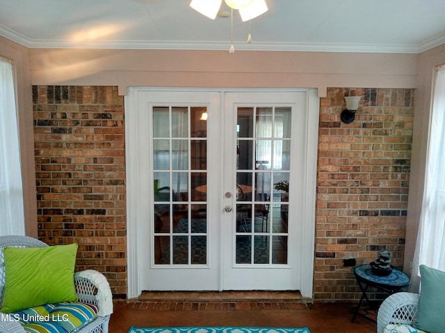 701 W Gresham St, Indianola, MS 38751 - doorway to outside with ornamental molding, french doors, and brick wall