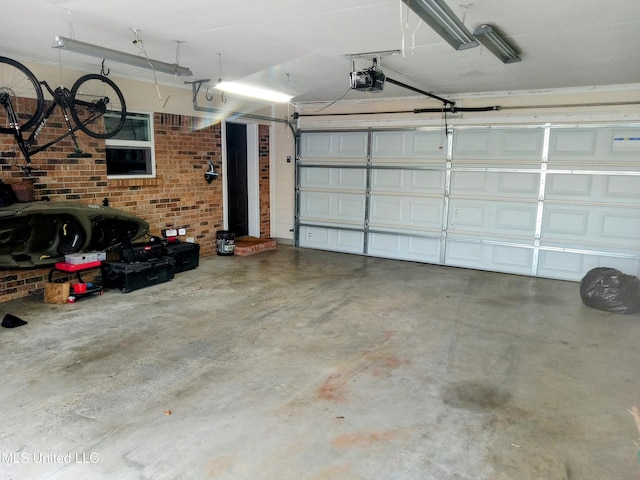 701 W Gresham St, Indianola, MS 38751 - garage featuring a garage door opener