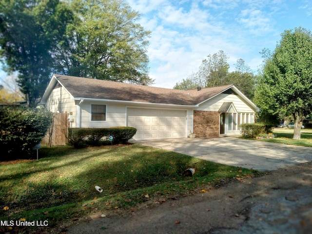 701 W Gresham St, Indianola, MS 38751 - ranch-style home featuring a garage and a front yard