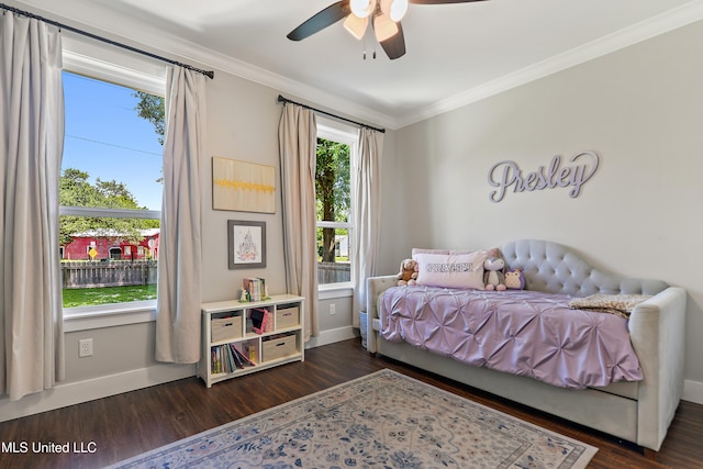 802 Old Spanish Trl, Bay Saint Louis, MS 39520 - bedroom with wood finished floors, ornamental molding, baseboards, and a ceiling fan