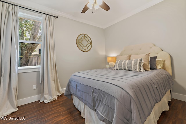 802 Old Spanish Trl, Bay Saint Louis, MS 39520 - bedroom with wood finished floors, baseboards, ornamental molding, and ceiling fan