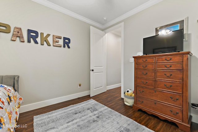 802 Old Spanish Trl, Bay Saint Louis, MS 39520 - bedroom with dark wood-style floors, ornamental molding, and baseboards