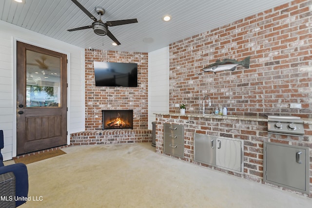 802 Old Spanish Trl, Bay Saint Louis, MS 39520 - unfurnished living room featuring a brick fireplace, a ceiling fan, carpet, and wooden ceiling