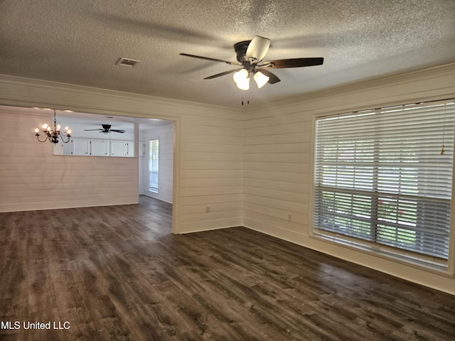 14162 E Marcie Rd, Gulfport, MS 39503 - spare room featuring crown molding, dark wood-type flooring, a textured ceiling, and ceiling fan with notable chandelier