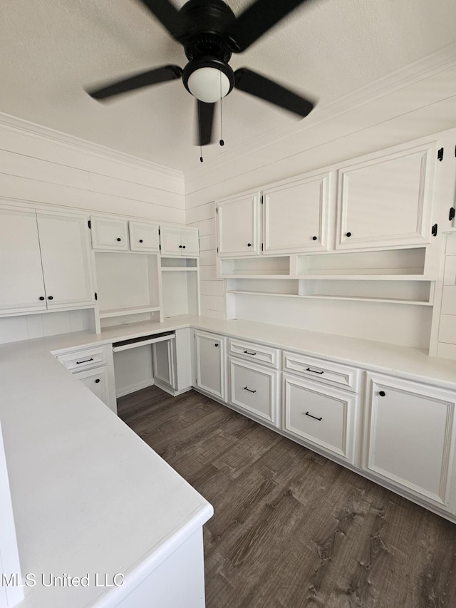 14162 E Marcie Rd, Gulfport, MS 39503 - kitchen featuring white cabinets, ornamental molding, dark wood-style floors, and ceiling fan