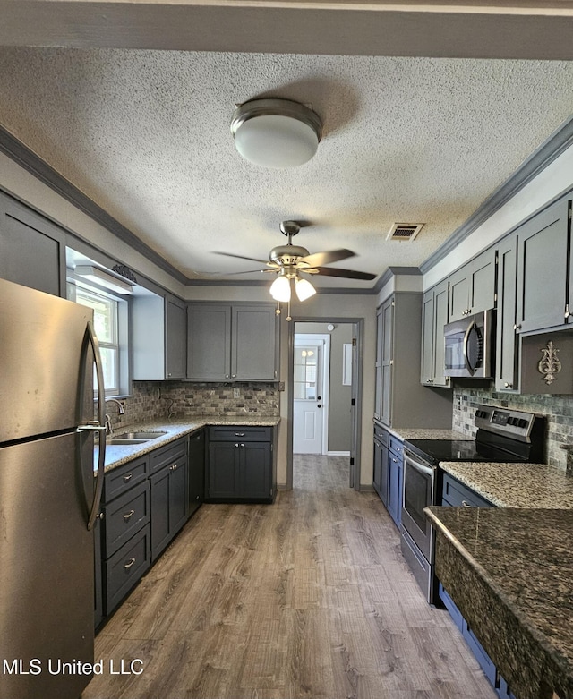 14162 E Marcie Rd, Gulfport, MS 39503 - kitchen featuring visible vents, a sink, a wealth of natural light, and stainless steel appliances