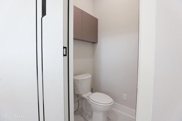 bathroom featuring toilet